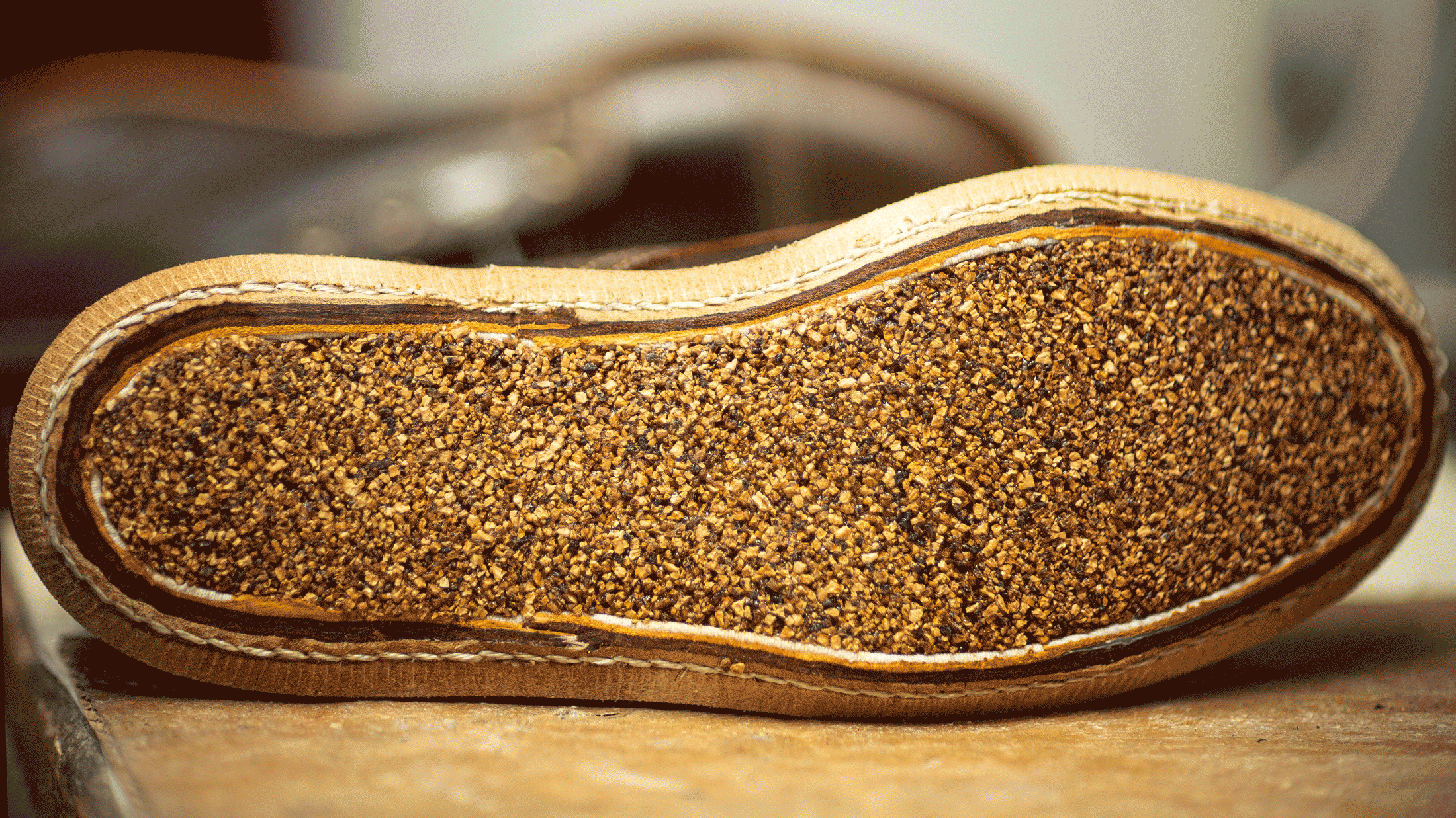 animation zooming in on cork filling in bottom of boot