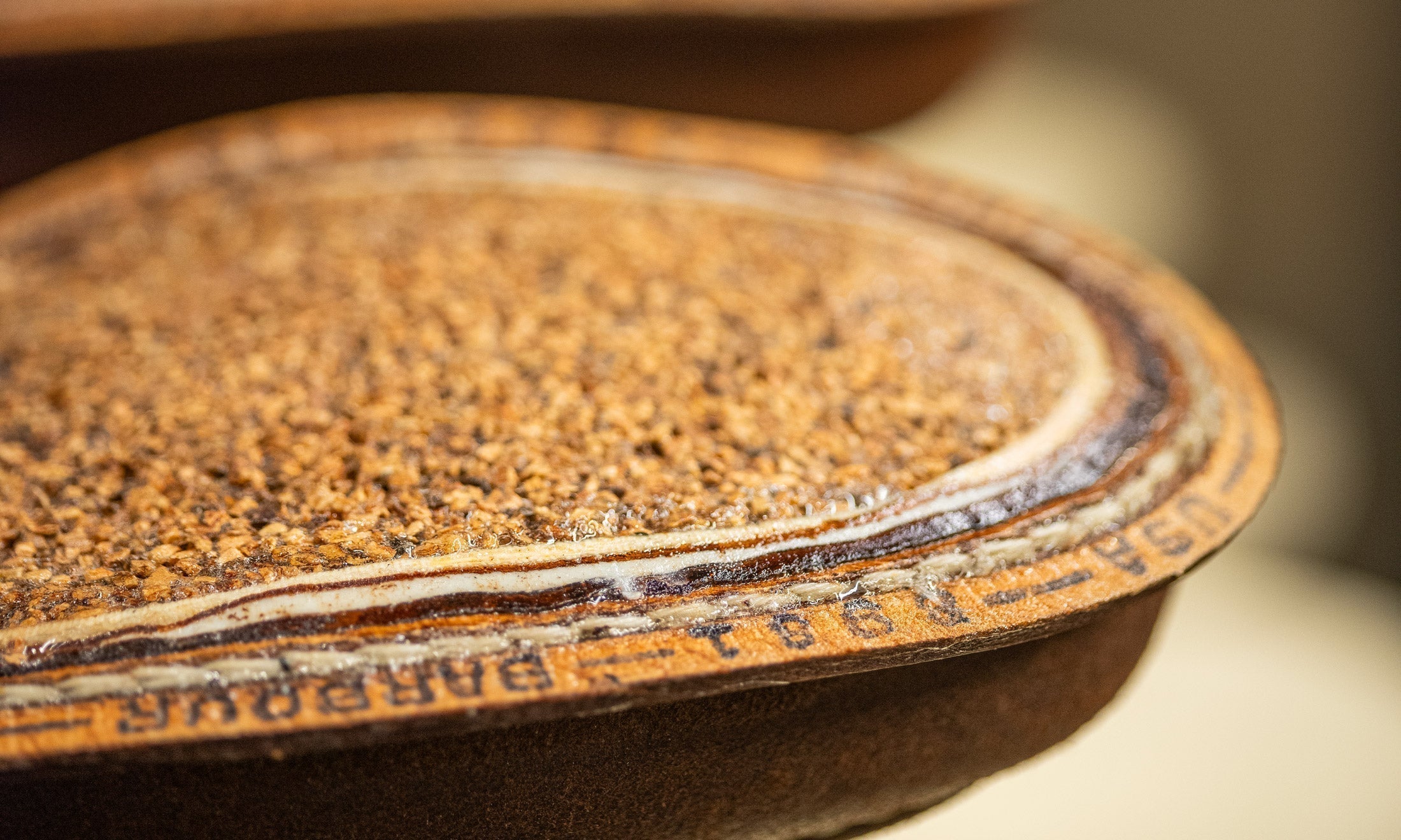 close up of boot in production with cork visible