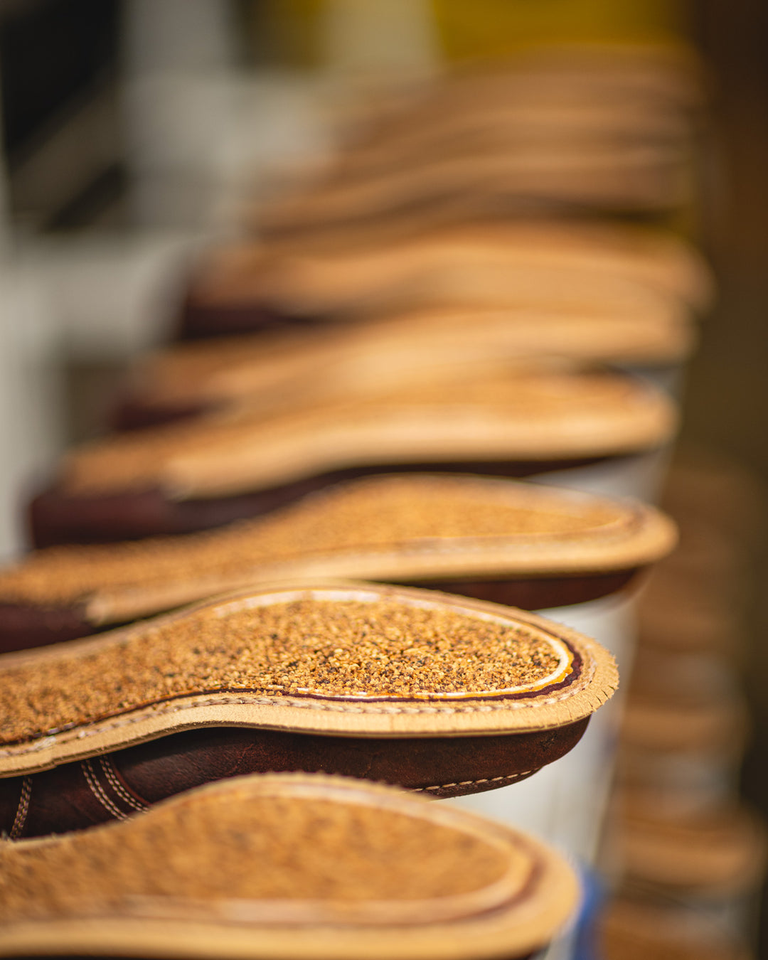 upside down boots showing cork filling in production