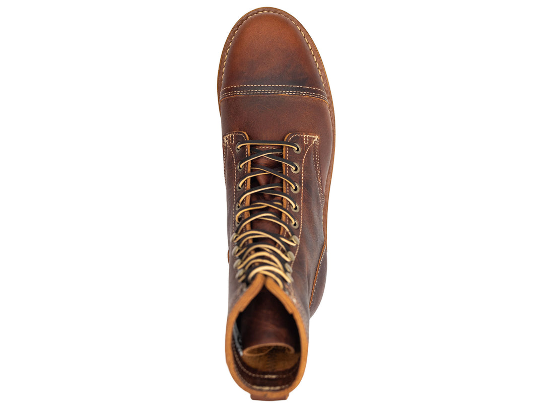 auburn brown leather boot on a white background topdown view