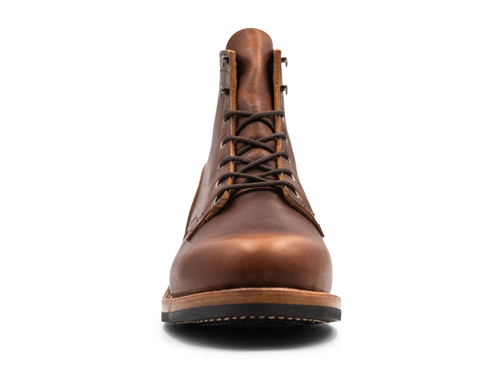 auburn brown leather boot on a white background front view