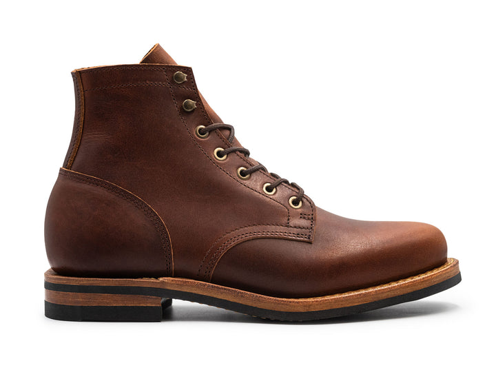 brown leather boot on a white background side view