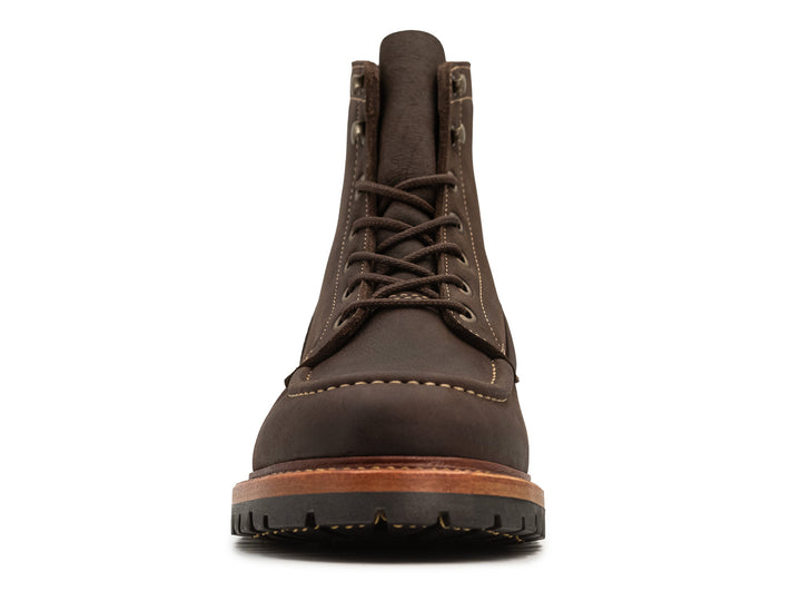 front view of brown textured kudu leather boot on white background