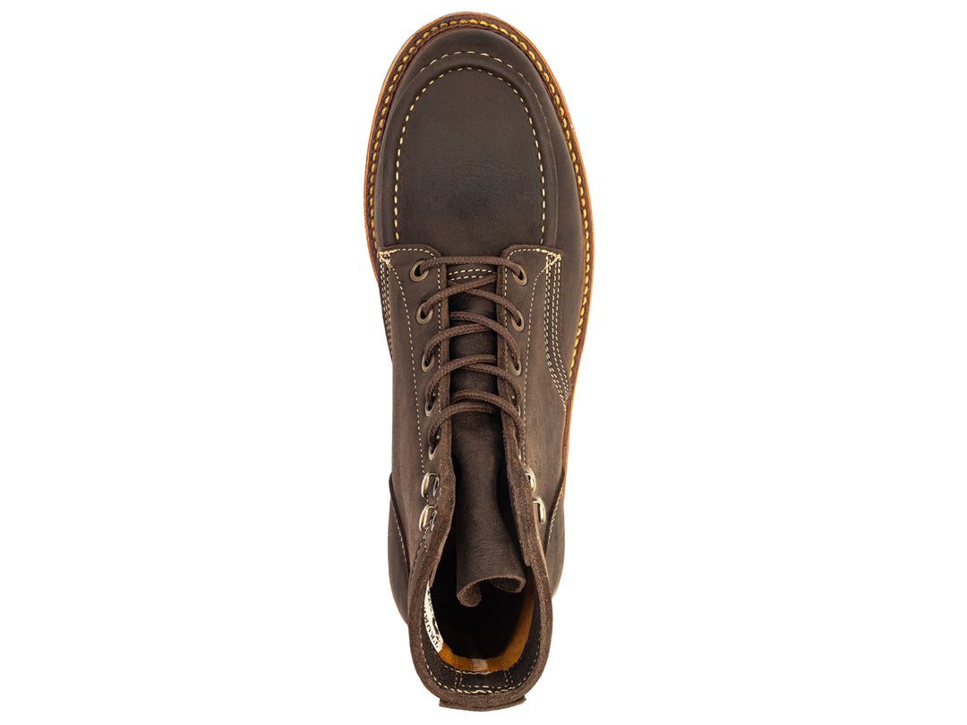 topdown view of brown textured kudu leather boot on white background