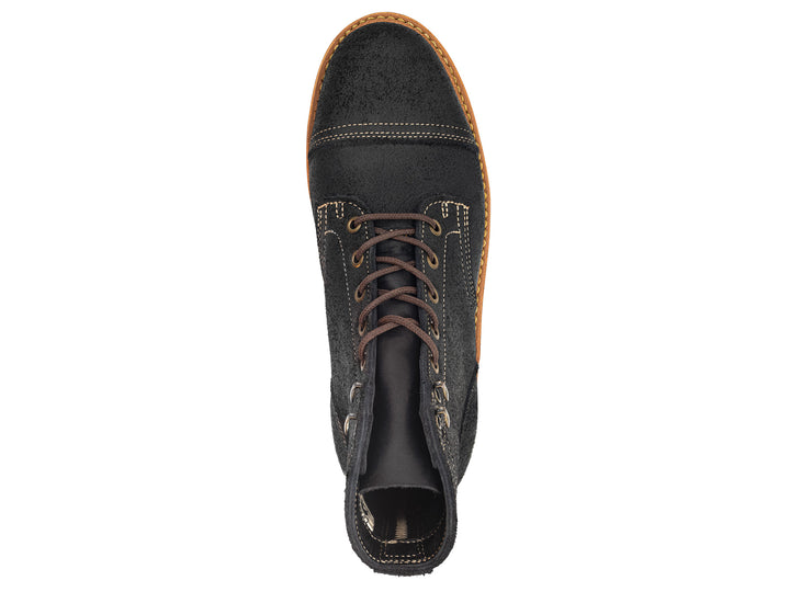 black leather boot on a white background topdown view