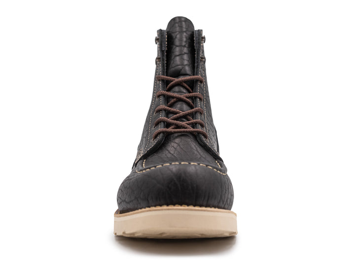 front view black shrunken bison boot on wedge sole on white background