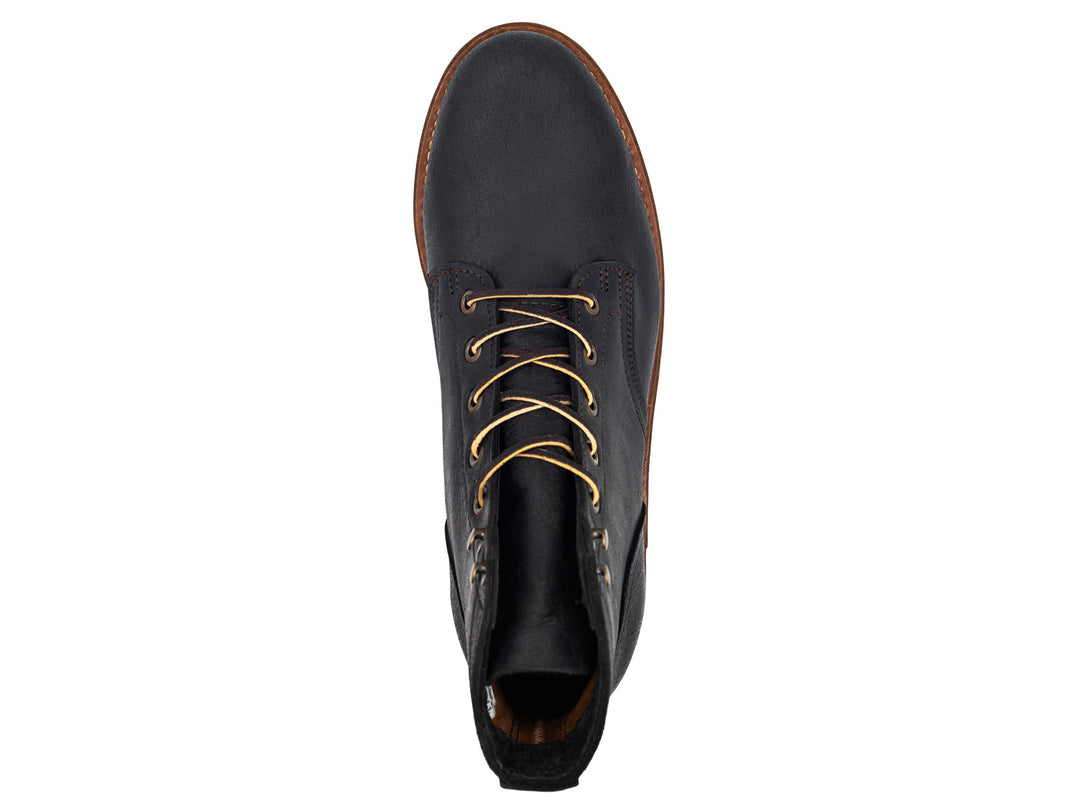 black leather boot on a white background topdown view