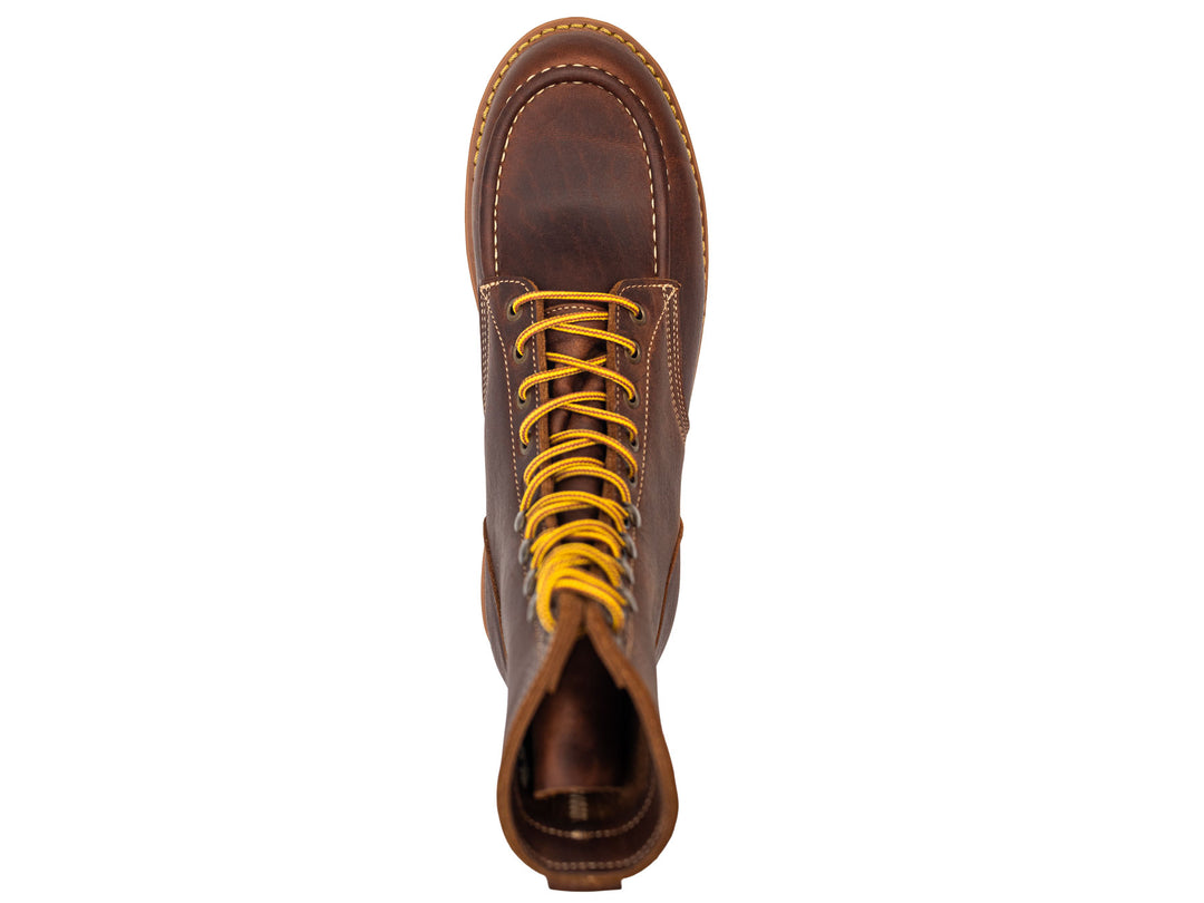 brown leather moc toe boot on a white background topdown view