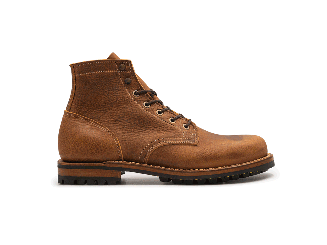tan leather boot on a white background rotating 360° view