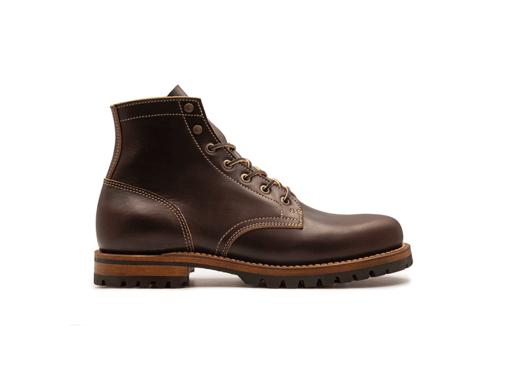 dark brown leather boot on a white background side view