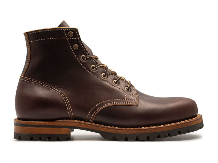 dark brown leather boot on a white background side view