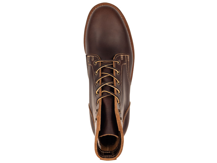 dark brown leather boot on a white background view from behind