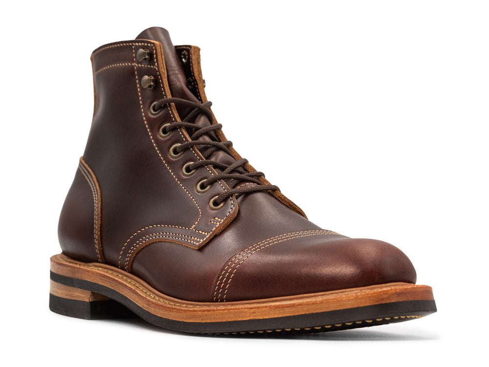 brown leather boot on white background 3QTR view