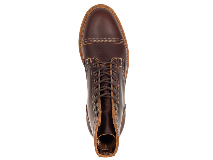 brown leather boot on white background topdown view