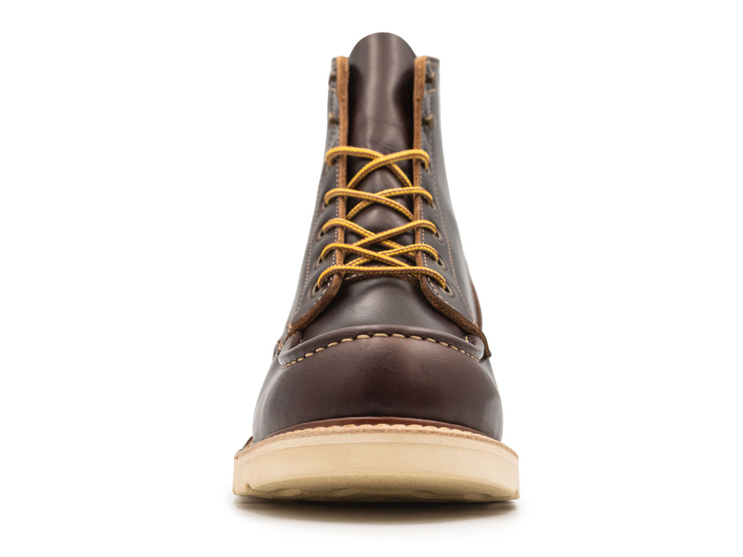 dark brown leather boot on a white background front view