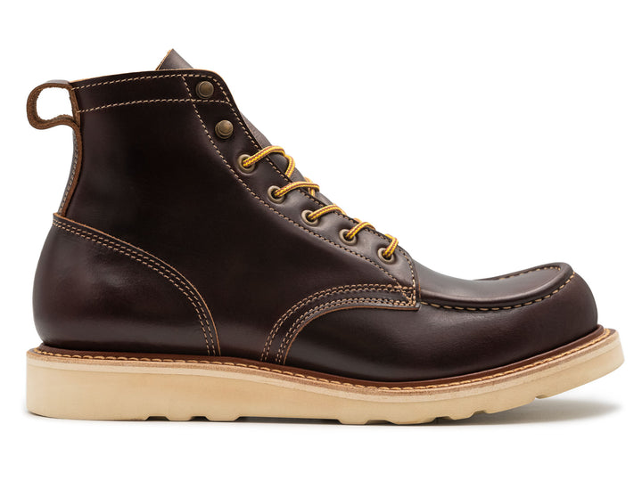 dark brown leather boot on a white background side view