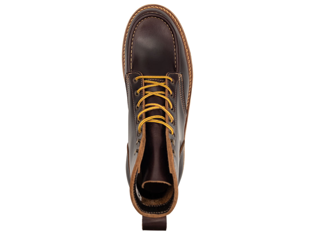 dark brown leather boot on a white background topdown view