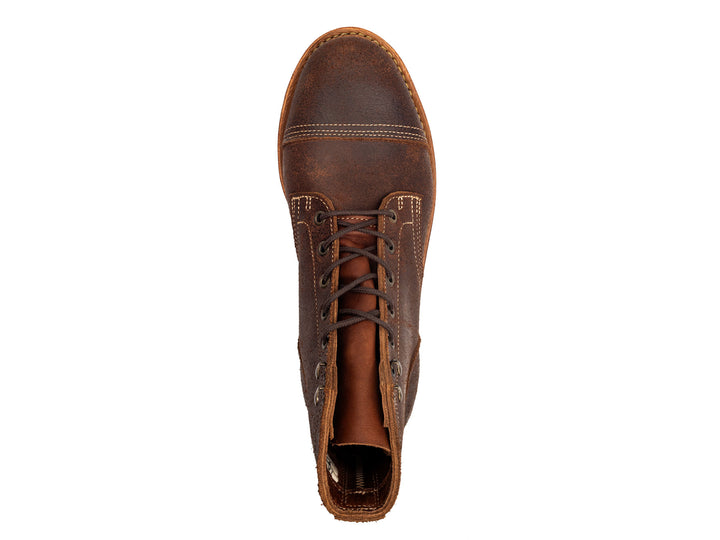 dark brown rough out leather boot top down view on white background