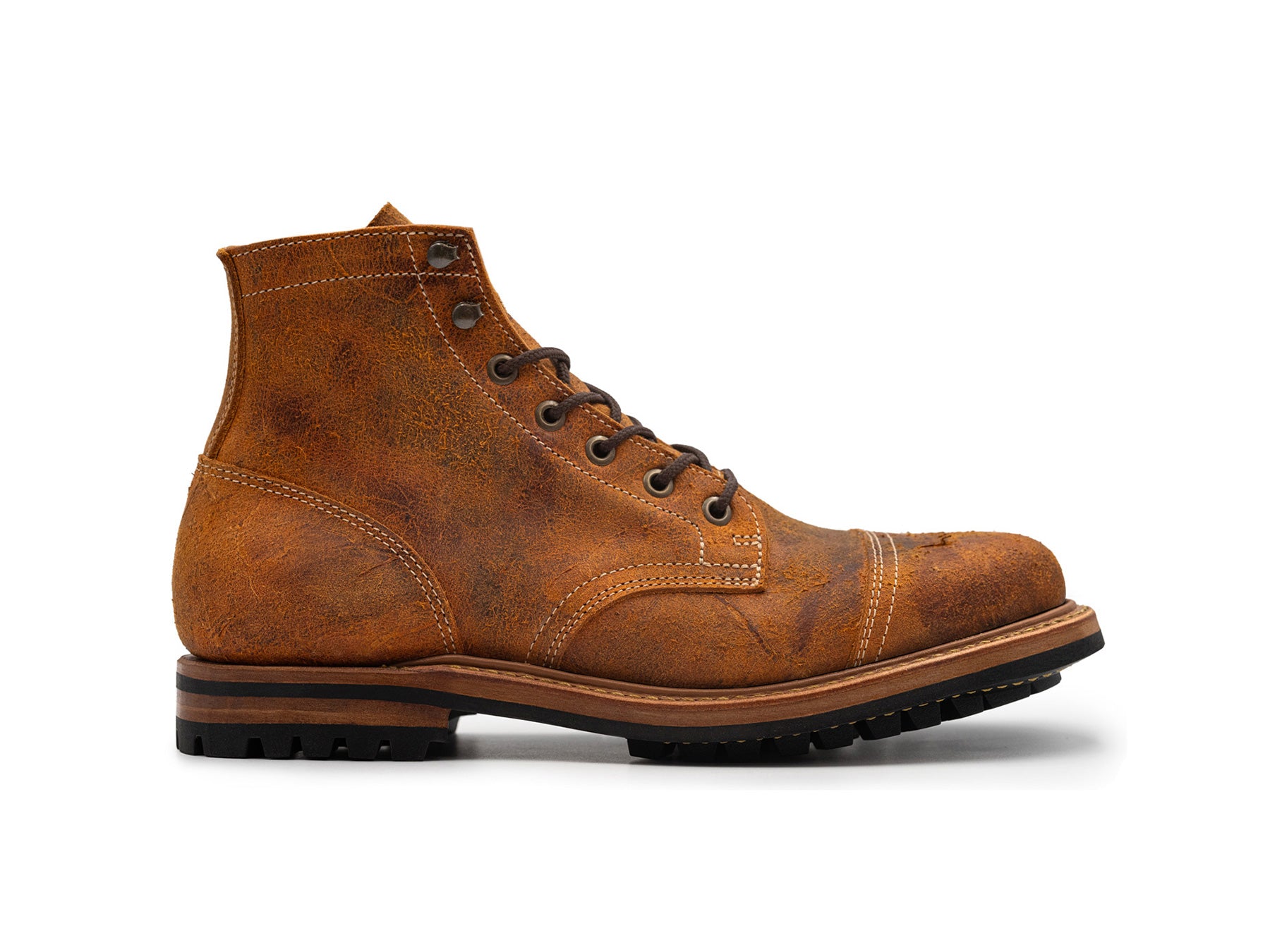 coach rambler leather boot side view on white background