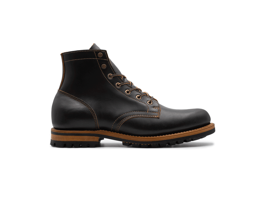 black leather boot on a white background rotating 360° view