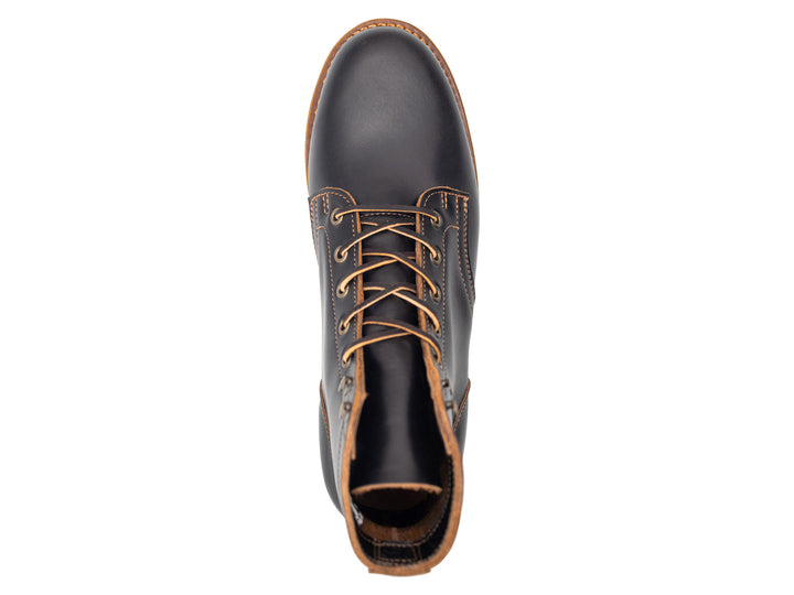 black leather boot on a white background topdown view