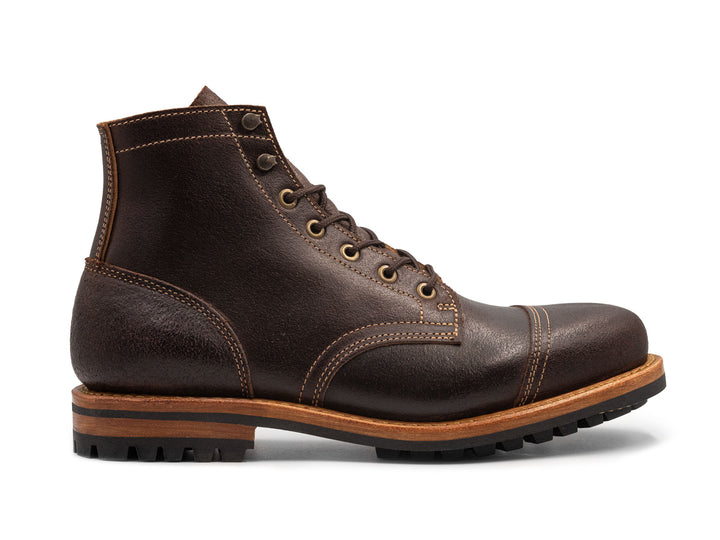 dark brown leather boot on a white background side view