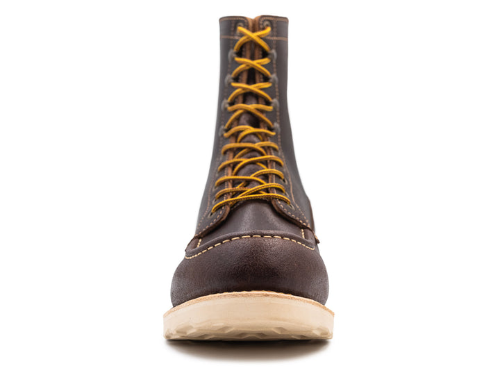 dark brown leather moc toe boot on a white background front view