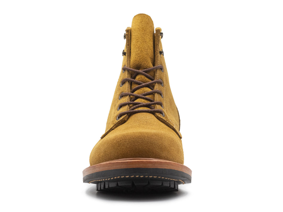 tan leather boot on a white background front view