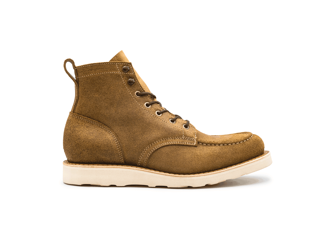 tan rough out leather moc toe boot on a white background 360° rotating view