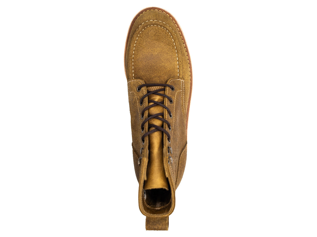 tan rough out leather moc toe boot on a white background topdown view