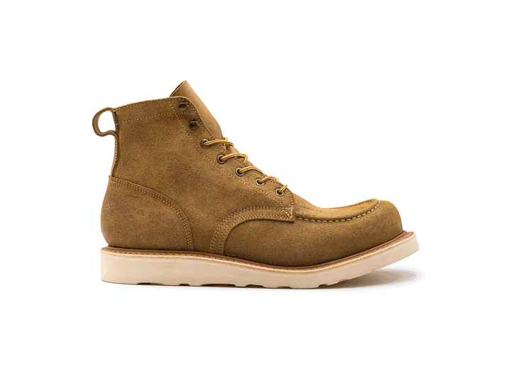 tan leather moc toe boot with yellow laces on a white background rotating 360° view
