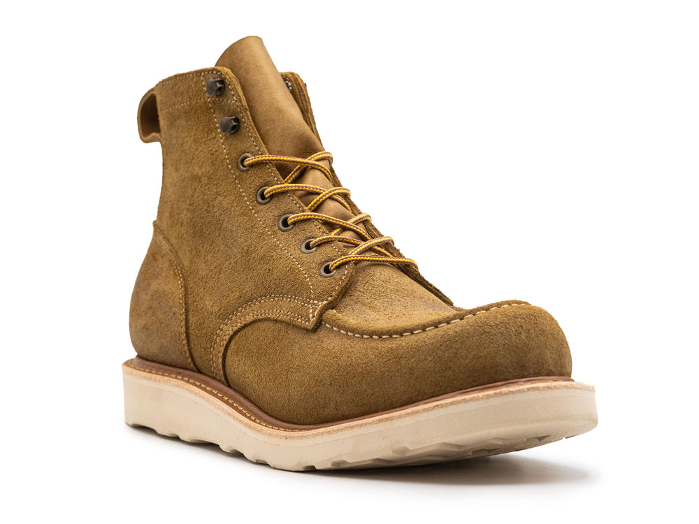 tan leather moc toe boot with yellow laces on a white background 3QTR view