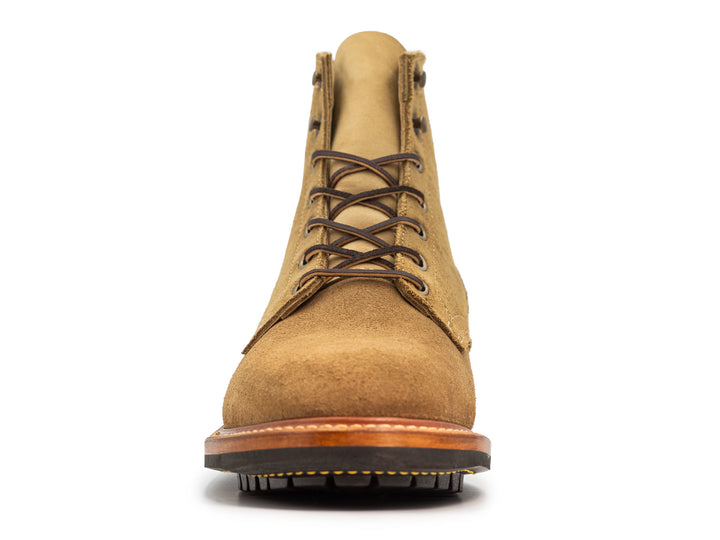 tan leather boot on a white background front view