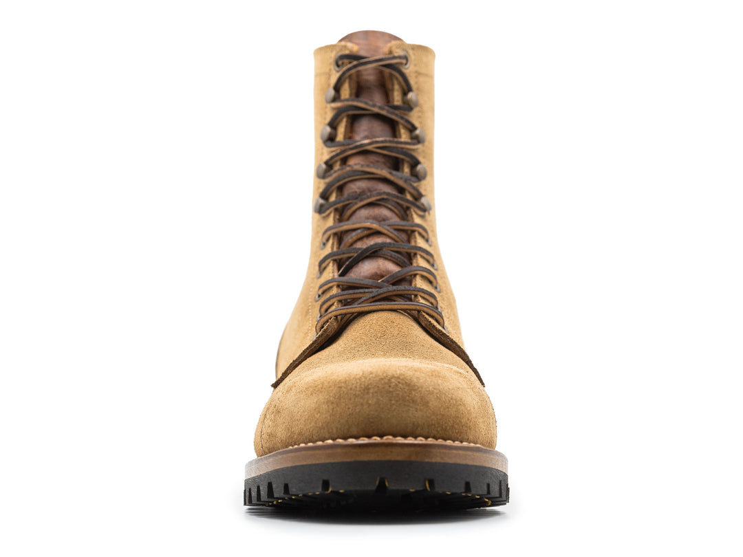 tan leather boot on a white background front view