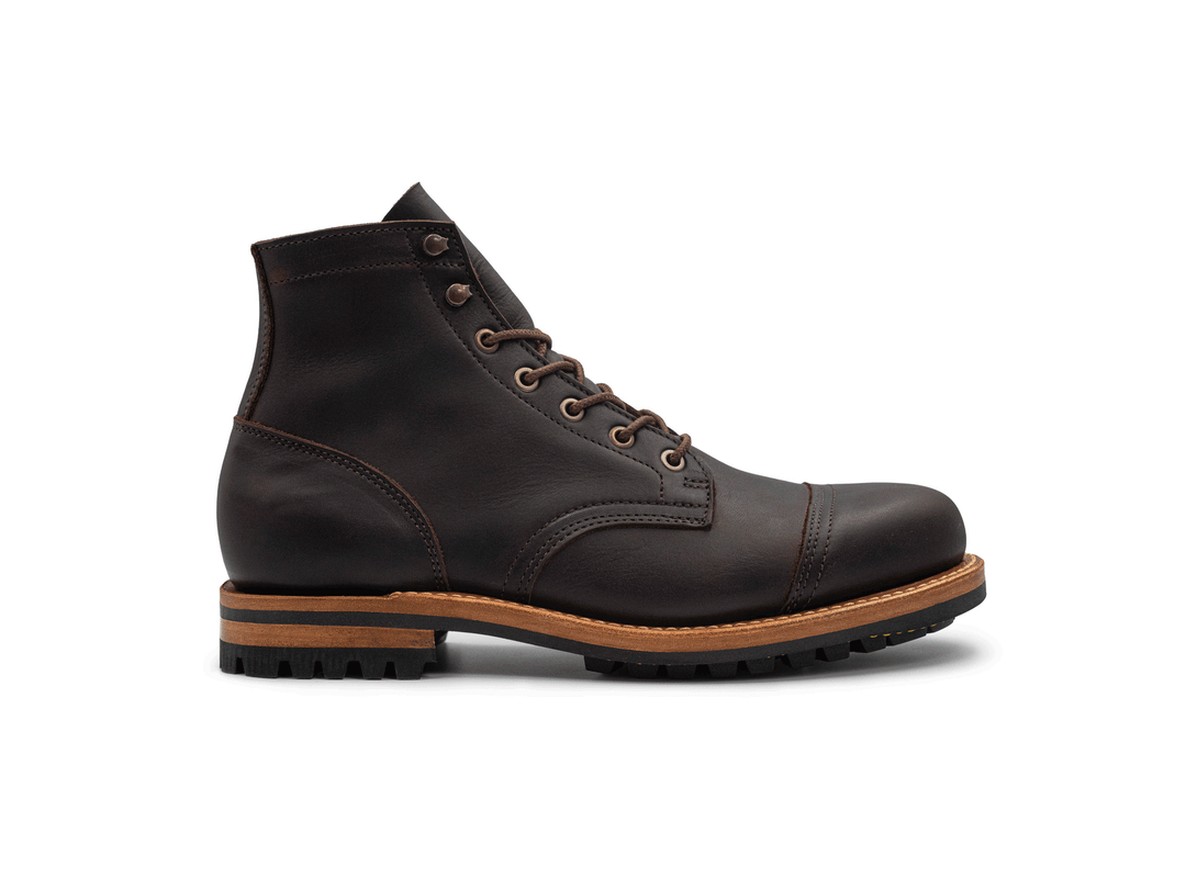 dark brown leather boot on a white background rotating 360° view