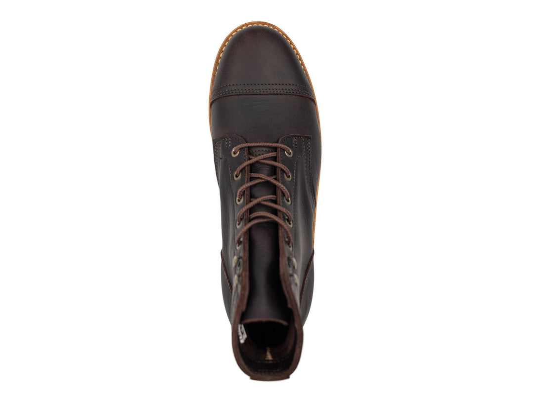 dark brown leather boot on a white background front view