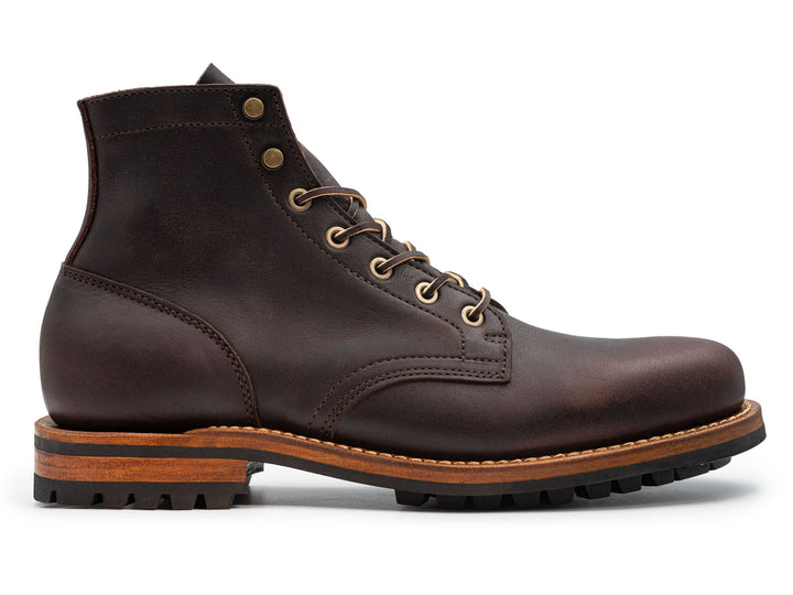dark brown leather boot on a white background side view