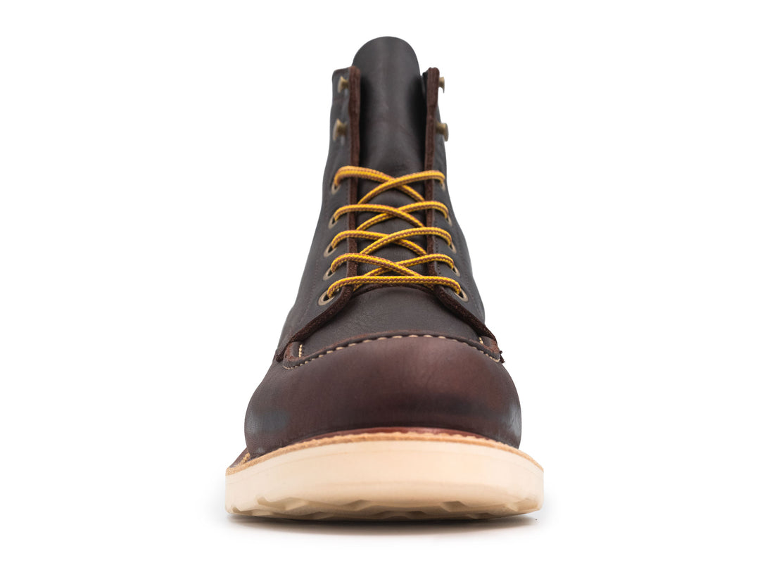 dark brown leather boot on a white background front view