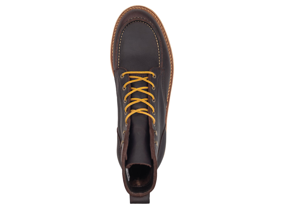 dark brown leather boot on a white background topdown view