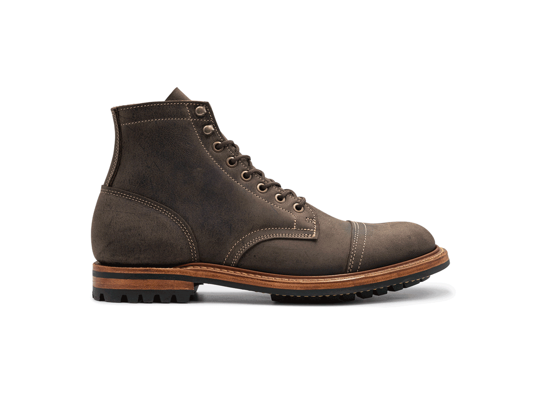 animated rotating 360° view of gray leather boot on white background