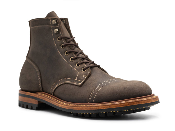 3QTR view of gray leather boot on white background