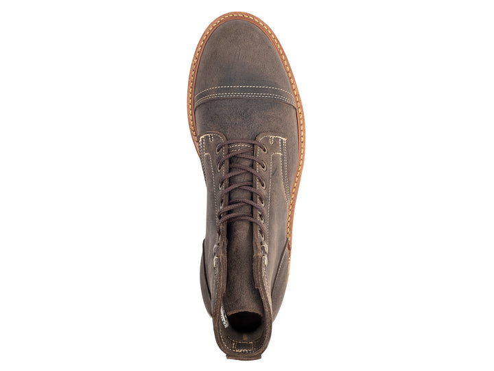 topdown view of gray leather boot on white background