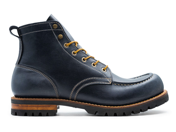 blue leather boot on a white background side view