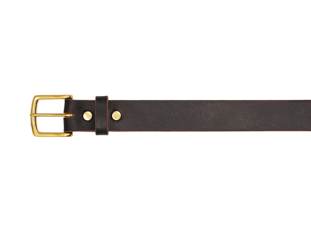 close up view of buckle on java waxed flesh leather belt on white background