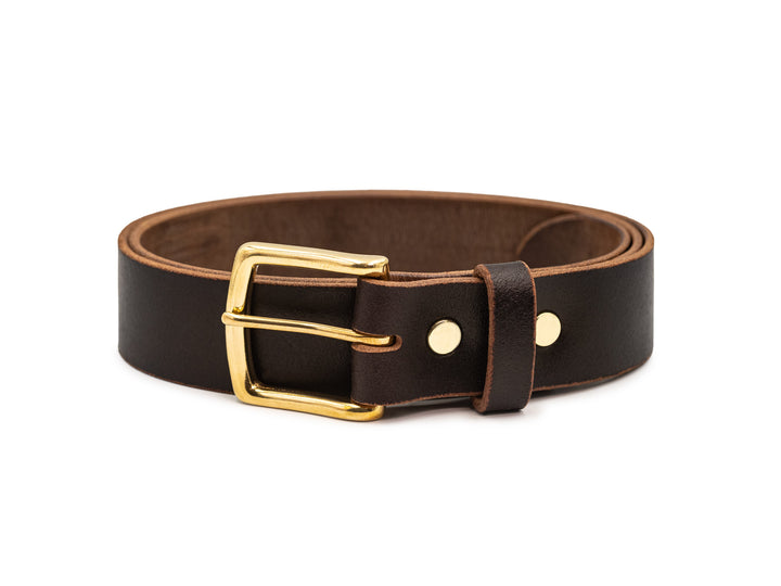 coiled view of java waxed flesh leather belt with brass buckle on white background