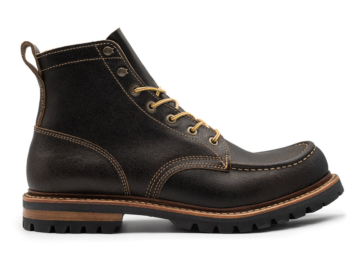 dark brown leather boot on a white background side view