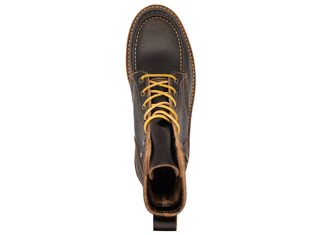 dark brown leather boot on a white background topdown view