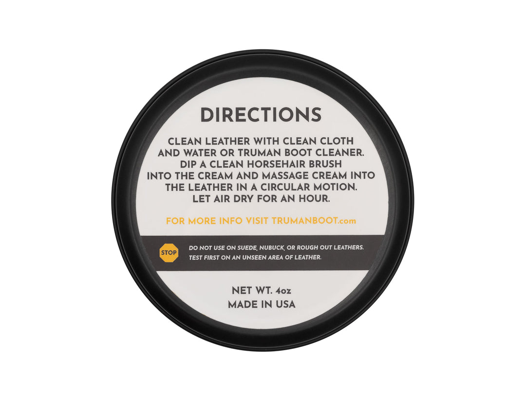 bottom side of tin can of leather conditioner