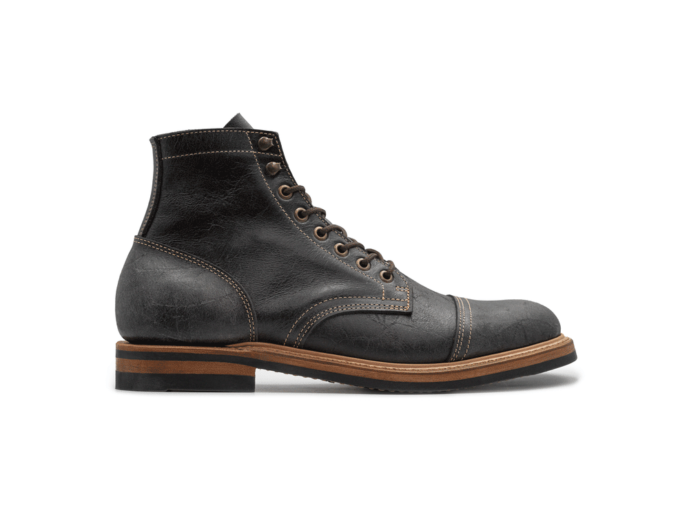 rotating 360° view of gray textured leather boot on white background