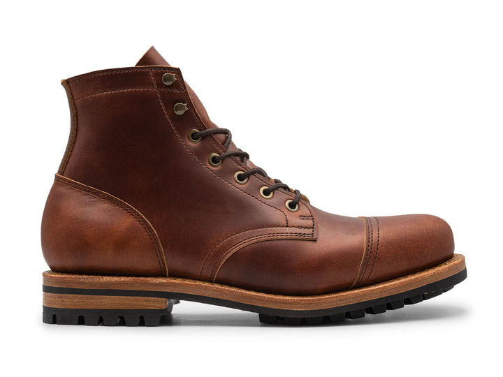 auburn brown leather boot on a white background side view